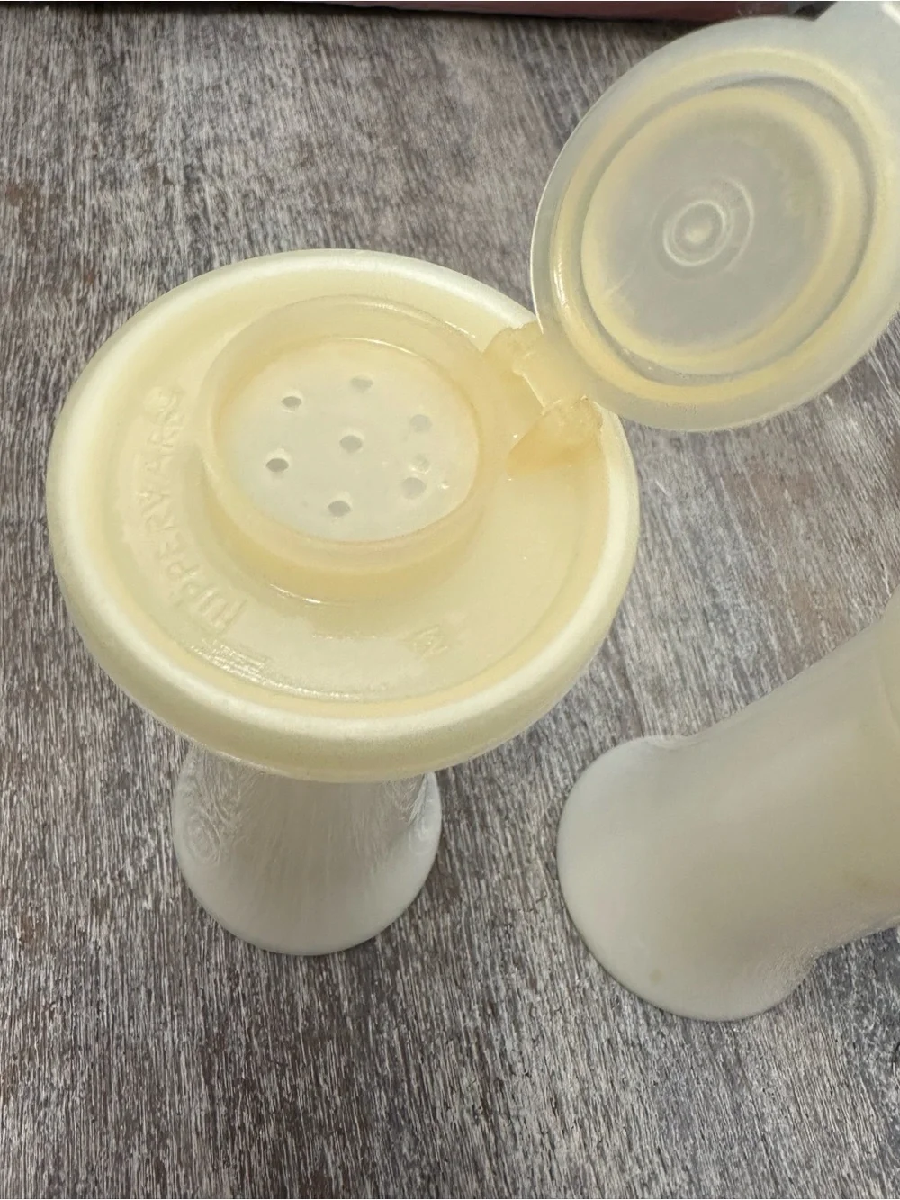 Vintage Tupperware Cream Flip-Top Salt and Pepper shakers (2)